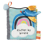 Children's soft book with bird and rainbow design on a white background